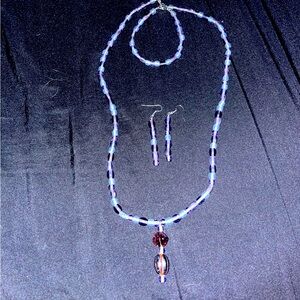 Purple bead necklace with matching earrings and bracelet